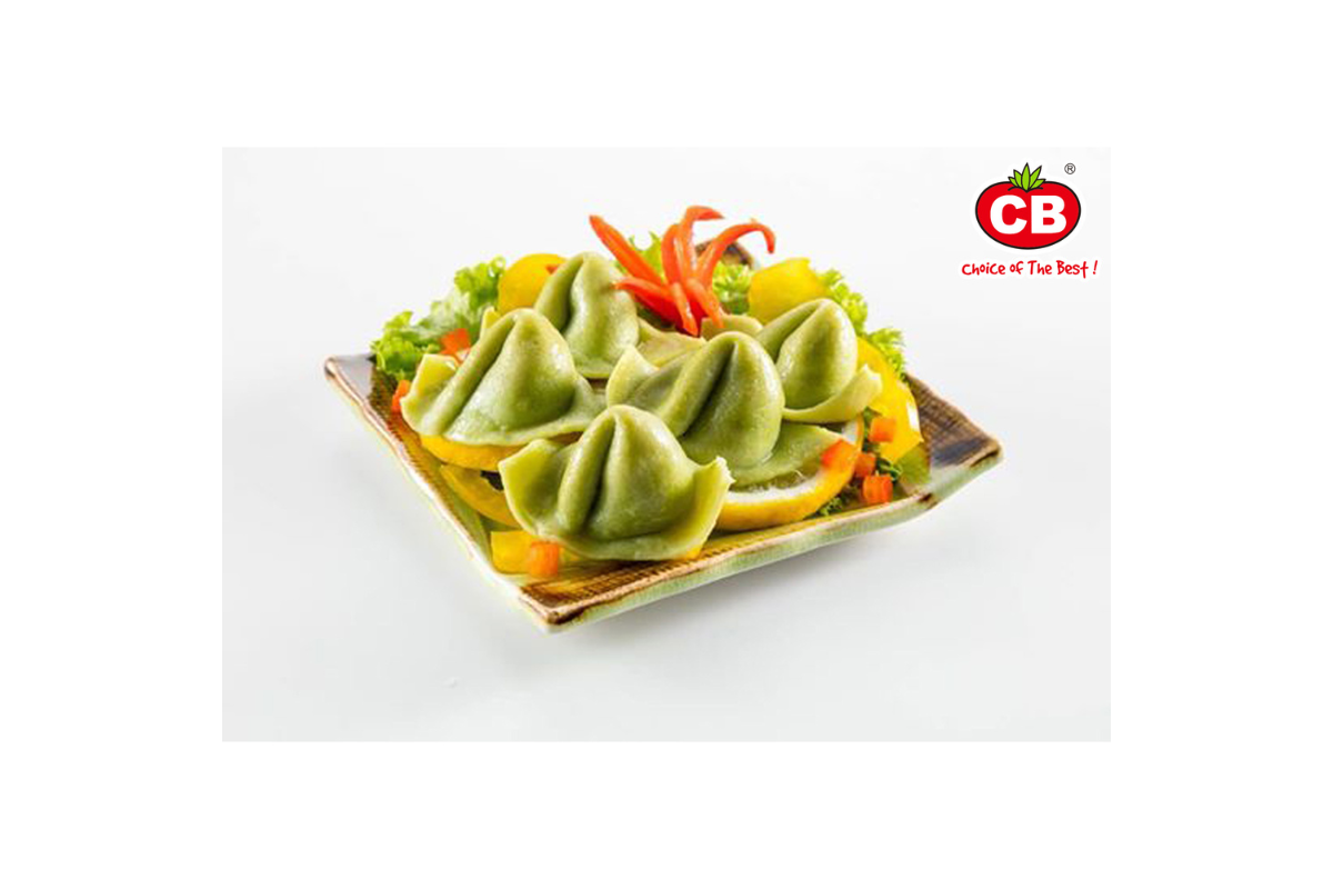 Fish dumpling with veggies on a plate