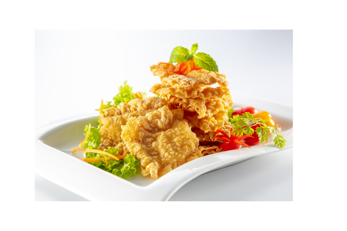 Fried dish on a white plate with a light background
