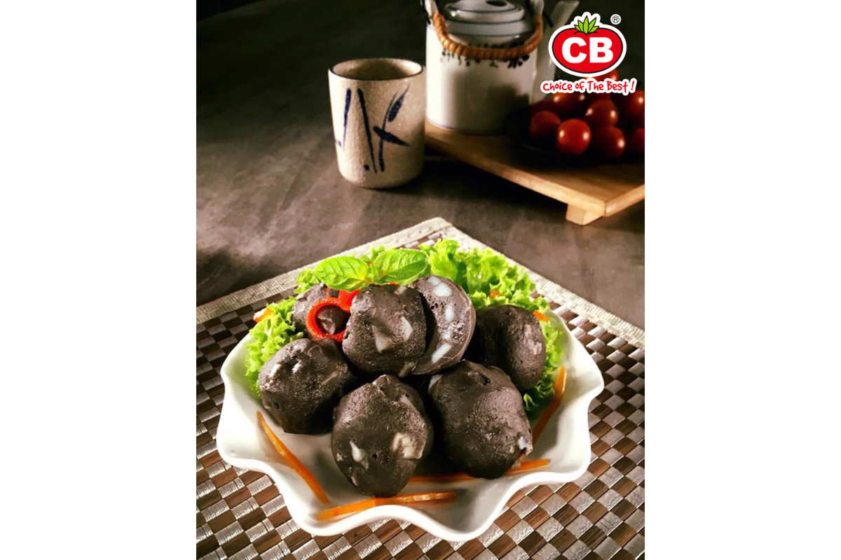 A plate of squid ink cuttlefish balls.