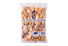 Packaged fully cooked popcorn chicken on a white background
