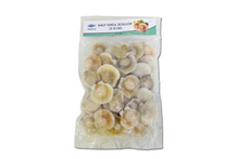 Packaged half shell scallops in a clear plastic bag on a white background
