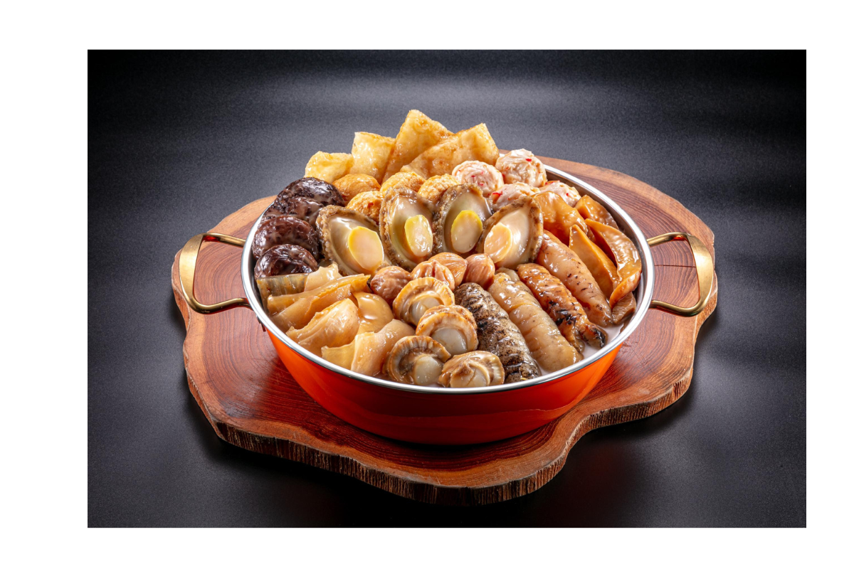Assorted dried seafood in a bowl on a wooden board with a dark background