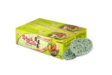 Box of spinach noodles with a sample dish on a white background