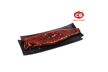 Unagi on a black plate with CB brand logo on a white background